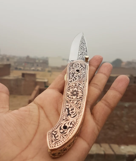Handmade D2 Steel Folding Knife: Engraved Copper Handle, Leather Sheath & Wood Box - Image 4